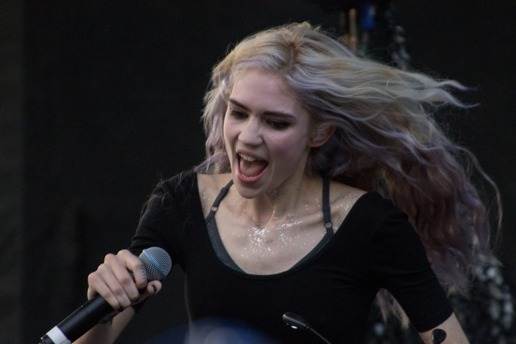 Grimes Teases Fans with Preview of New Song “I Wanna Be Software”