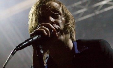 Interview: Legendary Punk Singer Dennis Lyxzén Talks Limiting Guitars On New INVSN LP, New Music From Refused and Being Musically "All Over The Place"