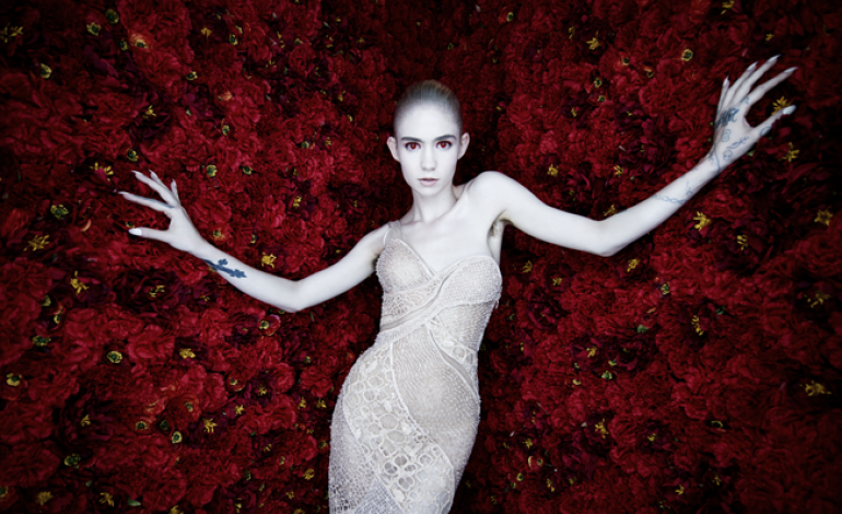 Grimes Shares Funky New Song “I Wanna Be Software”