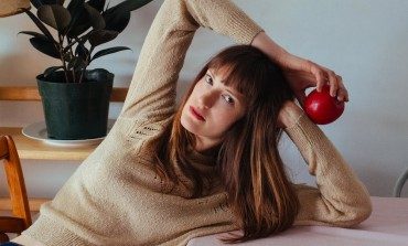 Annie Hart of Au Revoir Simone Releases New Video With Karaoke Synth-Pop for “Hard To Be Still”
