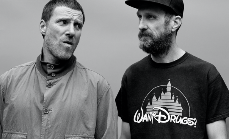 Sleaford Mods Dance In The Road In New Music Video For “Nudge It” Featuring Amy Taylor Of Amyl and the Sniffers