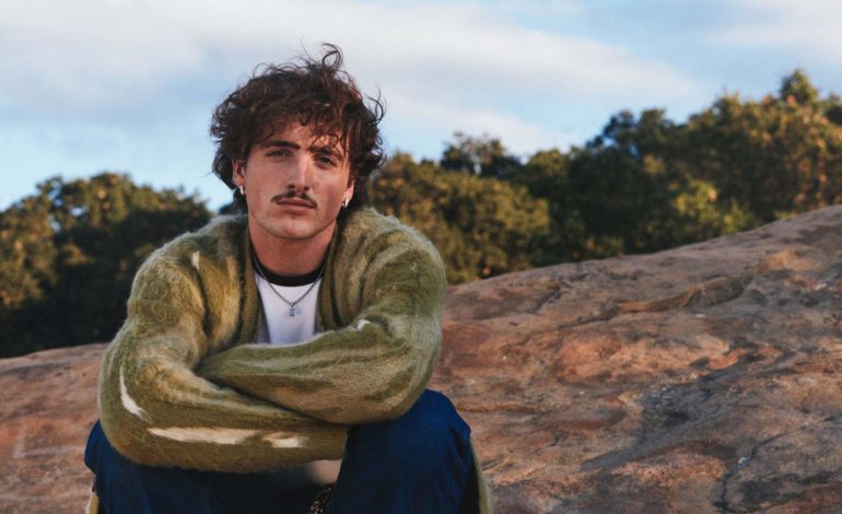 Benson Boone Performs Queen’s “Bohemian Rhapsody” With Cardboard Cutout Of Brian May During Coachella Weekend Two Set