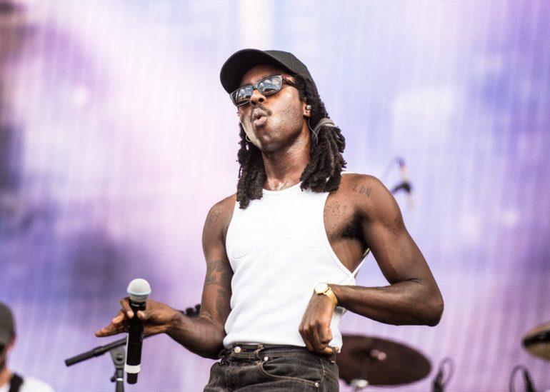 Blood Orange Teams Up With Caroline Polachek, Daniel Caesar & More On New Single & Video “The Field”