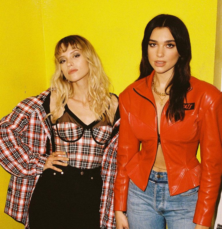 Dua Lipa And Angèle Drunkenly Wander Through The Streets Of London In New Music Video For “Fever”